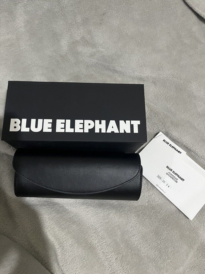 Blue Elephant Sunglasses with Case and Box (Category: Sunglasses & Eyewear) located in Mandaue City. Submitted by zinniaxclaire (Listing ID 1461474771, Image 3). Description: - Brand: Black Blue Elephant - Model: MAYA - Condition: New/Excellent (implied by inclusion of original packaging) - Includes: Original box, black case, authenticity cards - Flaws: Case - Ideal for: Everyday wear.
