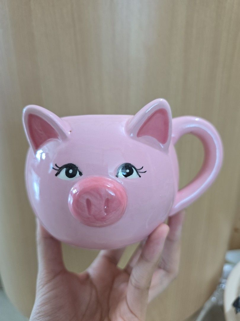 Blue Magic pig piggy cap mug gift (Category: Coffee & Tea Tableware) located in Mandaluyong City. Submitted by miecaella (Listing ID 1461378686, Image 1). Description: This is FREE for my Cup/Mugs buyers.