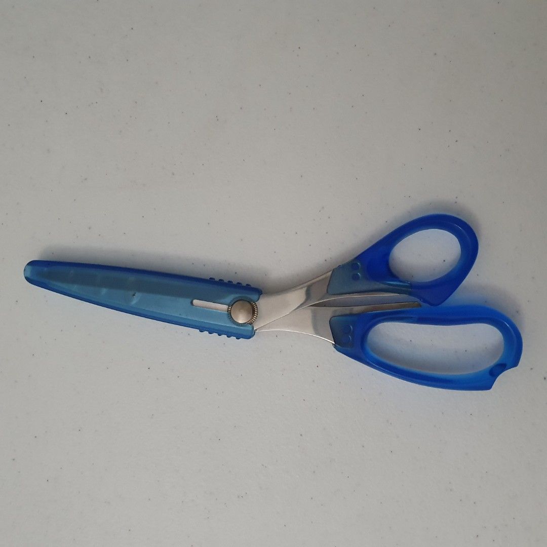 Blue Stainless scissors with cover (Category: Stationery & School Supplies) located in Paranaque City. Submitted by cobien (Listing ID 1461425858, Image 2). Description: - Blue scissors with a protective cover - Made of stainless steel for durability - Approximately 8.5 inches in length - Ideal for various cutting tasks - Safe and easy to handle.