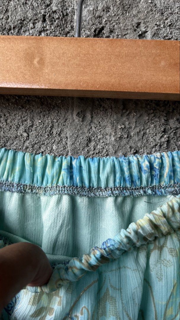 Blue Tiered Boho Maxi Skirt (Category: Skirts) located in Cabuyao City. Submitted by bulandos (Listing ID 1461426510, Image 3). Description: - Light and flowy tiered maxi skirt - Beautiful blue and tan paisley-inspired print - Comfortable elastic waistband - Versatile for casual or dressed-up looks - Ideal for summer days.