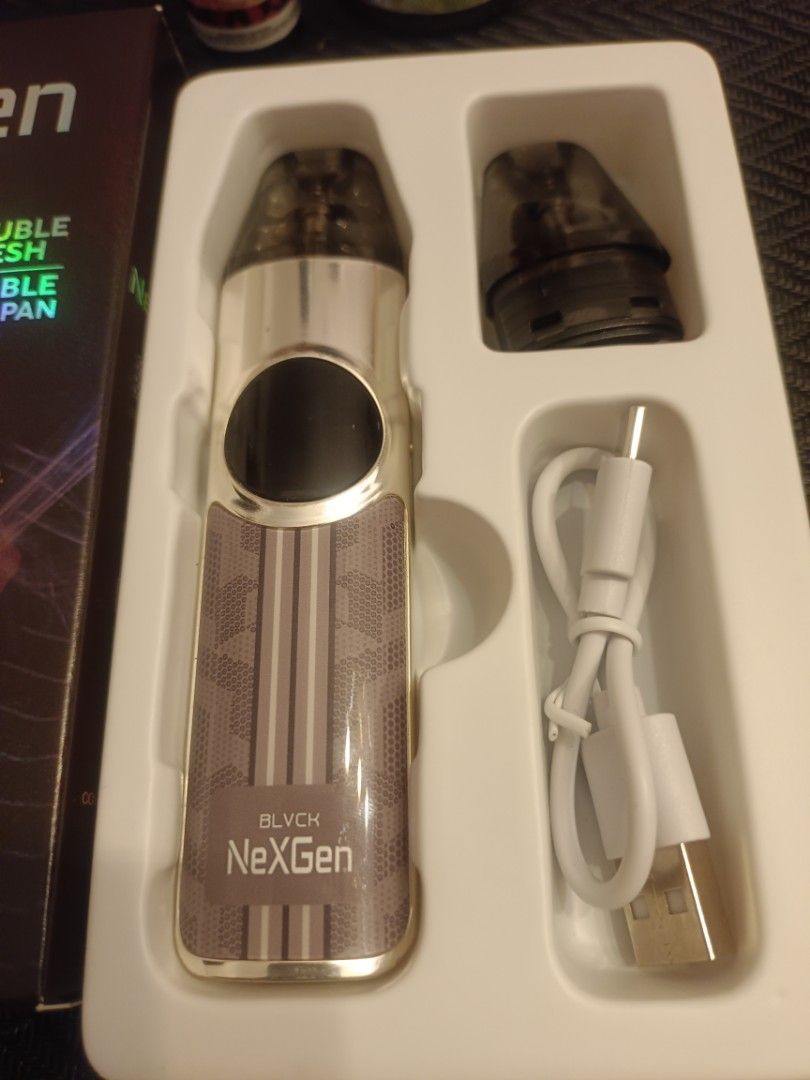 BLVCK NexGen Pod Kit with E-liquids (Category: Everything Else Others) located in Quezon City. Submitted by detaglejac52593 (Listing ID 1461560929, Image 2). Description: - BLVCK NexGen pod system - Includes pod and charging cable - Comes with 2 e-liquids: Demon Vape Ice Formula (Strawberry) and Beast Super Nammi (Spicy Mint) - Ideal for convenient, on-the-go vaping.