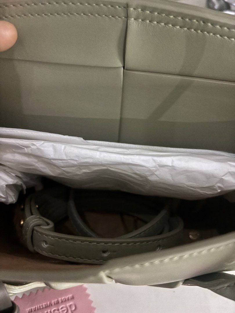 Bottega Veneta Mini Arco Handbag (Category: Luxury Bags & Wallets) located in Paranaque City. Submitted by corinne_see (Listing ID 1461460166, Image 3). Description: - Authentic Bottega Veneta Mini Arco bag - Color: Sage Green - Includes original dust bag - Ideal for carrying daily essentials - A stylish addition to any handbag collection.