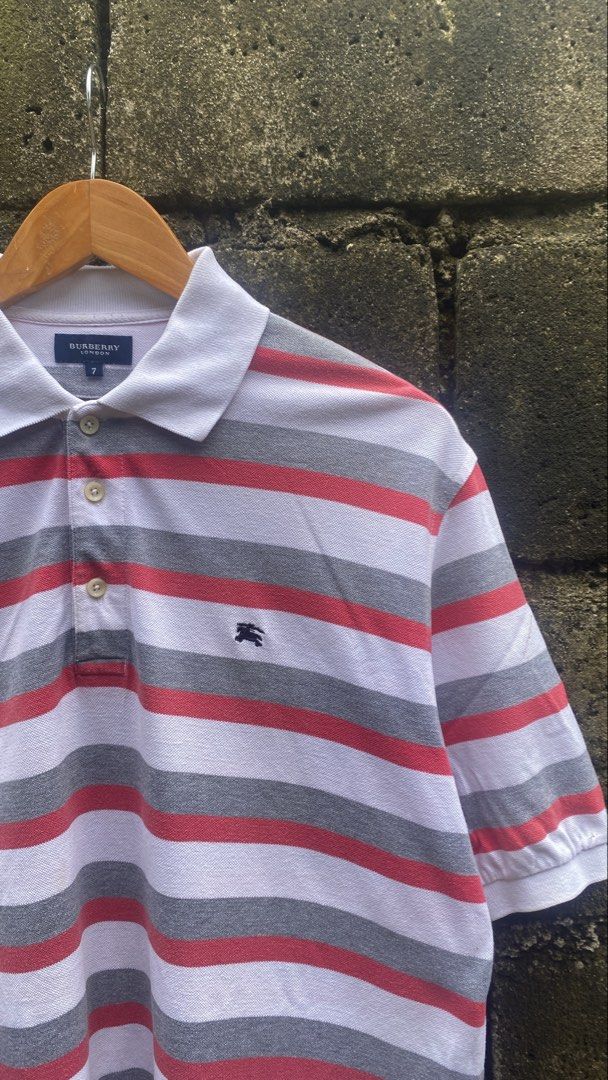 B*RBERRY POLO (Category: Announcements) located in Calamba. Submitted by foundthrift (Listing ID 1461383863, Image 2). Description: B*RBERRY POLO SHIRT Condition.excellent W 22 L 30 Size. Large to XLarge Fit Color rate 9/10 issue. Bura yun wash tag Price: 550 php Plus shipping fee Loc calamba laguna - Color may vary due the lighting - Payment first Gcash/Paymaya - No Cod - Shipping via J&T express - Check details before dm me .