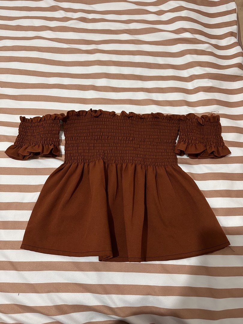 Brown Knitted Top (Category: Blouses) located in Valenzuela. Submitted by shopbychacha (Listing ID 1461389707, Image 1). Description: Brown Knitted Top Can fit from XS to S.