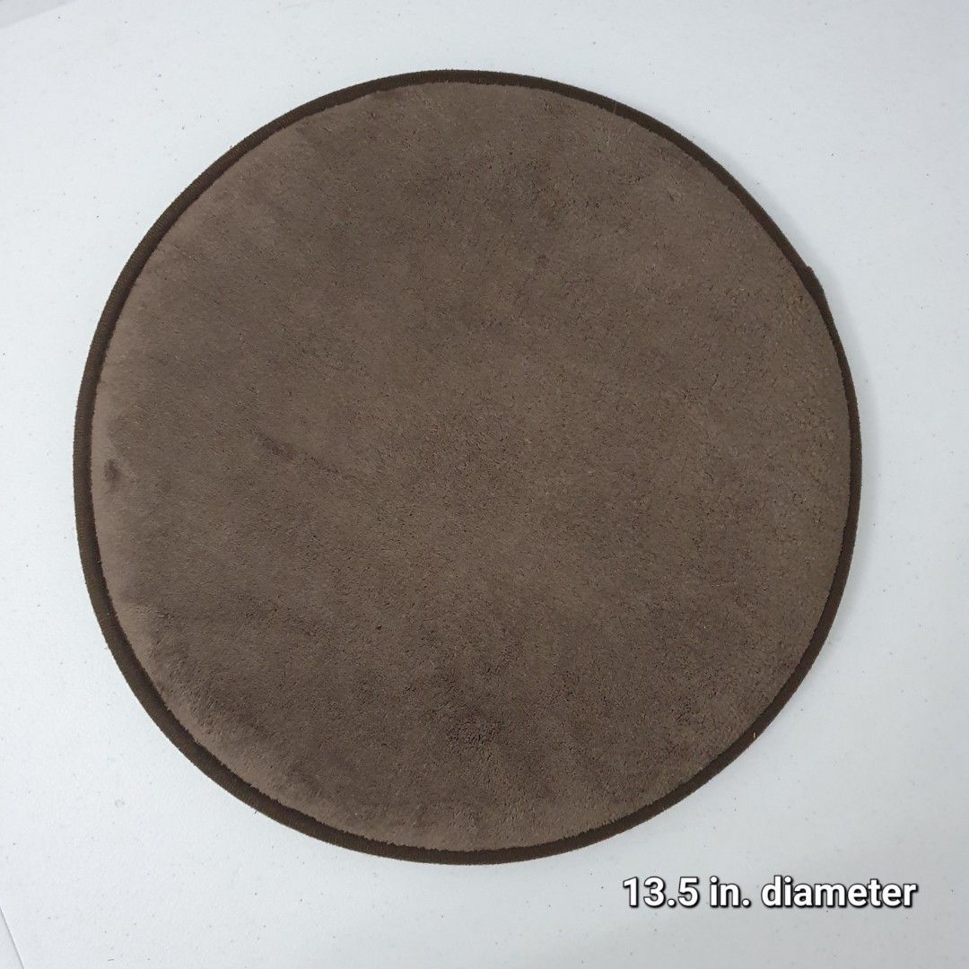 Brown Round Mat Chair cushion (Category: Carpets, Mats & Flooring) located in Paranaque City. Submitted by cobien (Listing ID 1461466018, Image 1). Description: - Round mat, 13.5 inches in diameter. - Rich brown top surface. - Textured beige underside for grip. - Dark brown edging for a finished look. - Perfect for protecting surfaces .