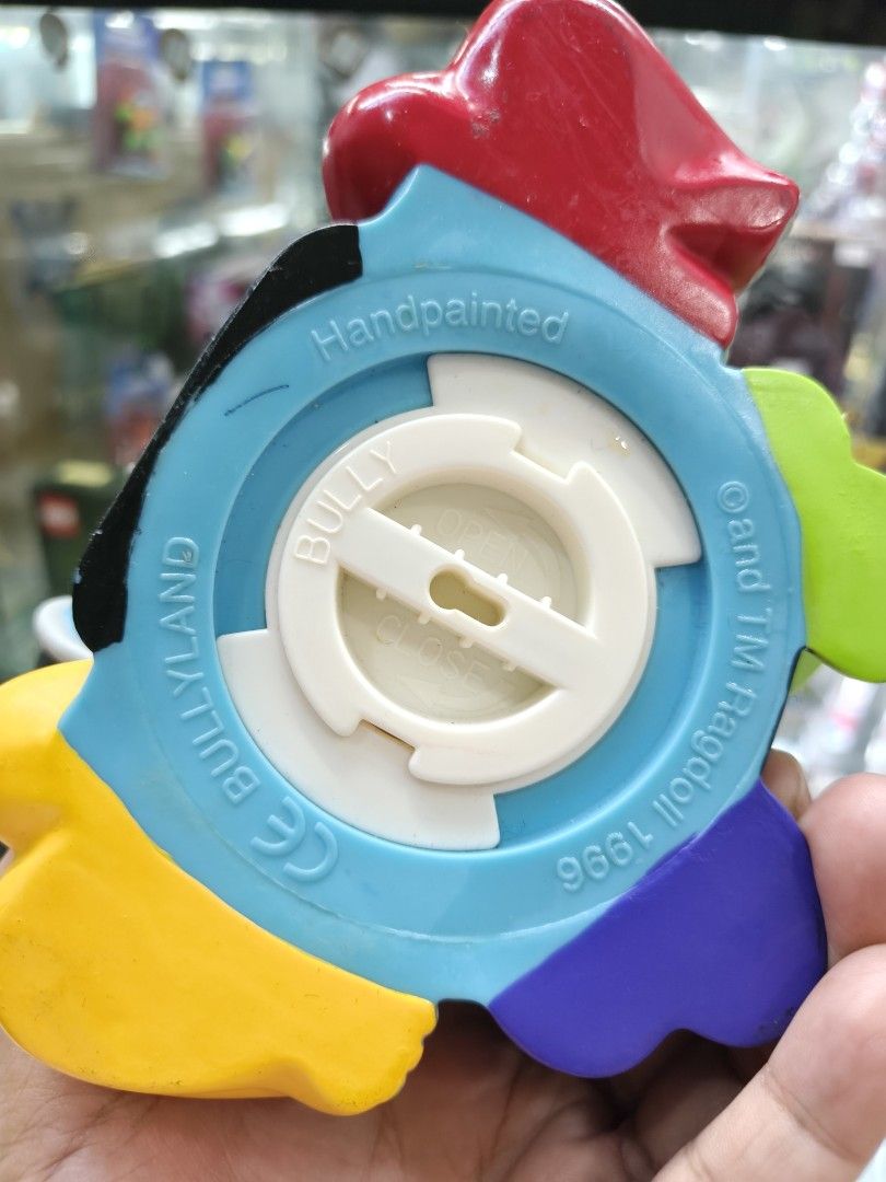 Bullyland Teletubbies Coin Bank 1996 (Category: Vintage Collectibles) located in Manila. Submitted by aterizz (Listing ID 1461444909, Image 2). Description: - Adorable Bullyland Teletubbies coin bank - Features Tinky Winky, Dipsy, Laa-Laa, and Po - Made in 1996 - Handpainted details - Ideal for Teletubbies collectors or as a fun gift for kids - Coin slot located on top - Easy access for retrieving savings from the bottom opening.