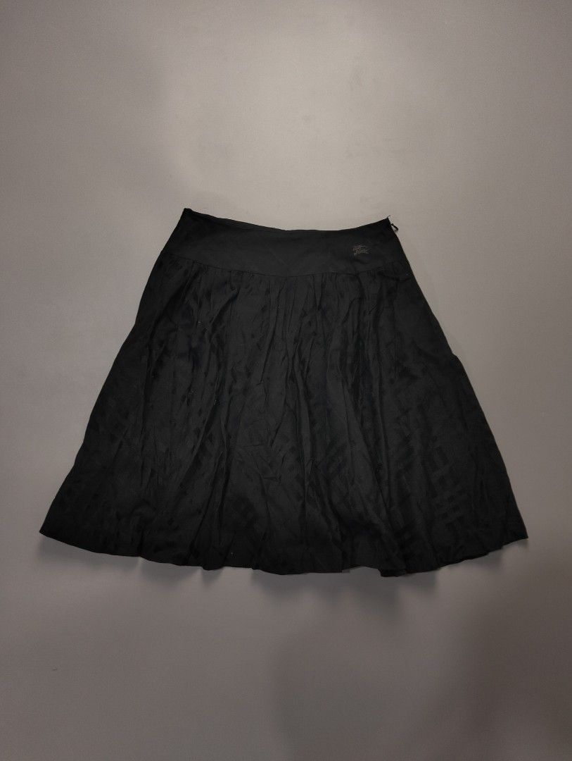 burberry blue label skirt (Category: Luxury Apparel) located in Bulacan. Submitted by recycloth_ (Listing ID 1461324500, Image 1). Description: burberry blue label skirt size on tag 36 waistline : 25-26 Length : 20" in great condition no issue or flaws HMU!.