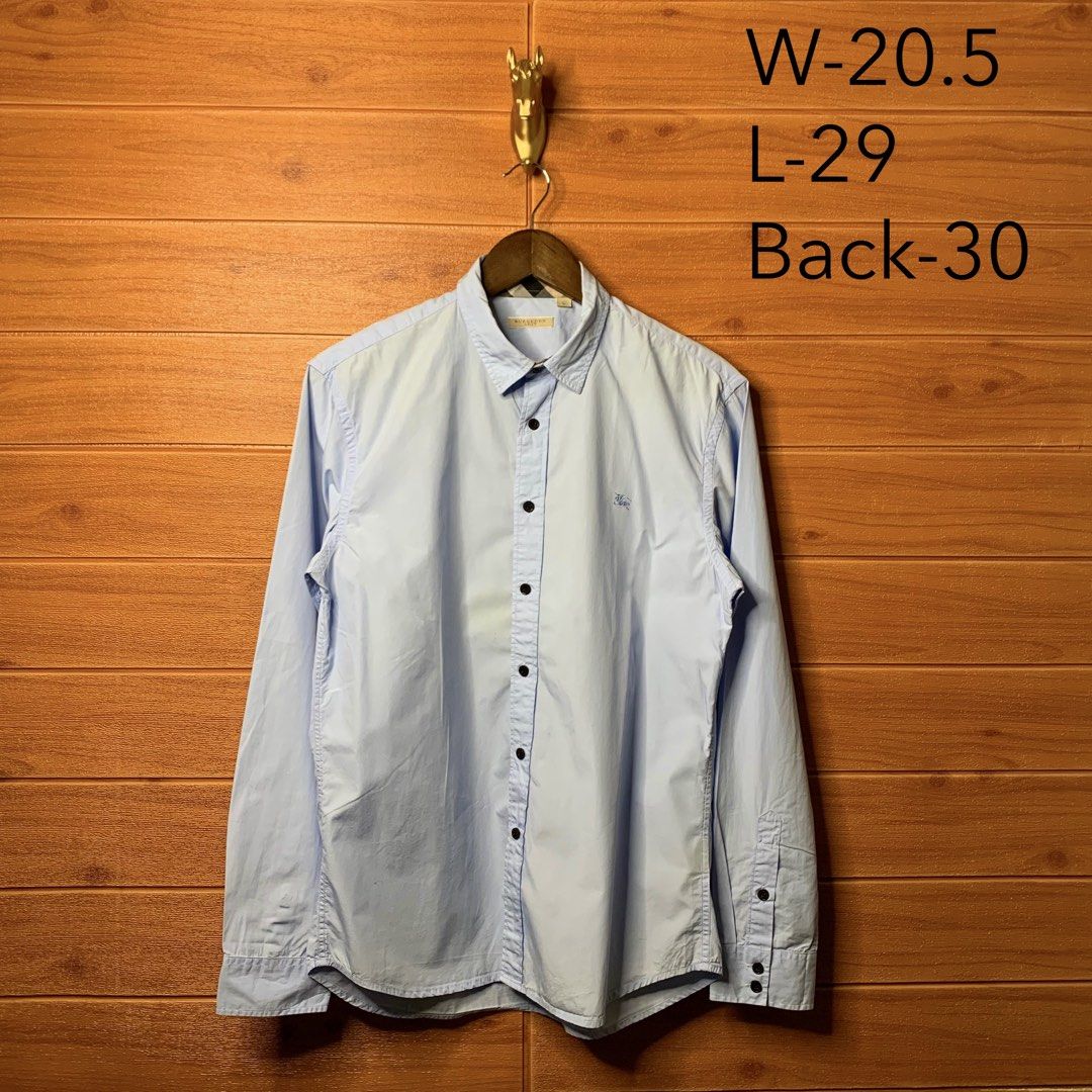 Burberry Brit Button down (Category: Formal Shirts) located in Quezon City. Submitted by donklasiko (Listing ID 1461544855, Image 2). Description: Condition: 9.5+/10 Pristine condition Issue: non Refer to the dimension 🤗 PM FOR MORE DETAILS NO RETURN, NO EXCHANGE & NO REFUND! ✅I ALSO ACCEPT TRADE/SWAP TO ANYTHING JUST DROP YOUR OFFER Please manage your expectations, this is a secondhand item. What you see is what you get 😊 💵MOP: GCASH, BDO or 