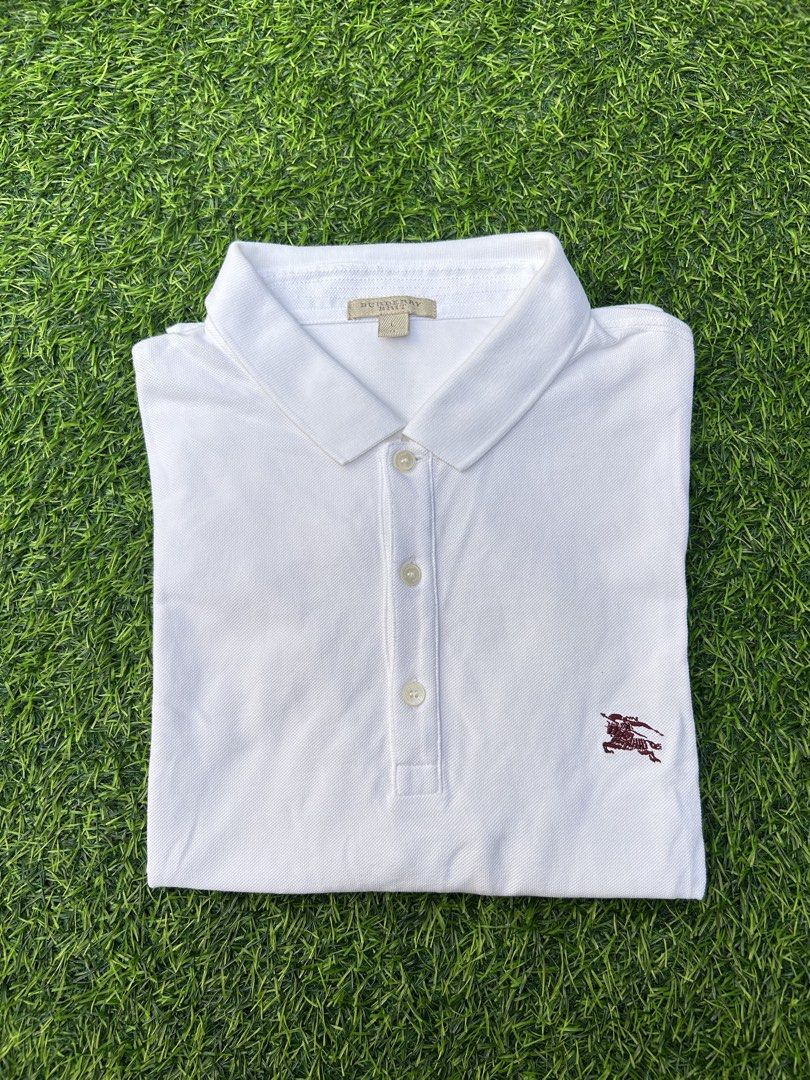 Burberry Brit Whit Polo Shirt (Category: Tshirts & Polo Shirts ) located in Davao. Submitted by sta_archive (Listing ID 1461472855, Image 2). Description: Burberry Brit Whit Polo Shirt Width - 20.5 Length - 29.5 (Large on tag) Color Rate - 9.5/10 Excellent Condition No Major Issues Slight Loose in Sleeve Hem (normal signs of usage) 750 + Shipping Fee .