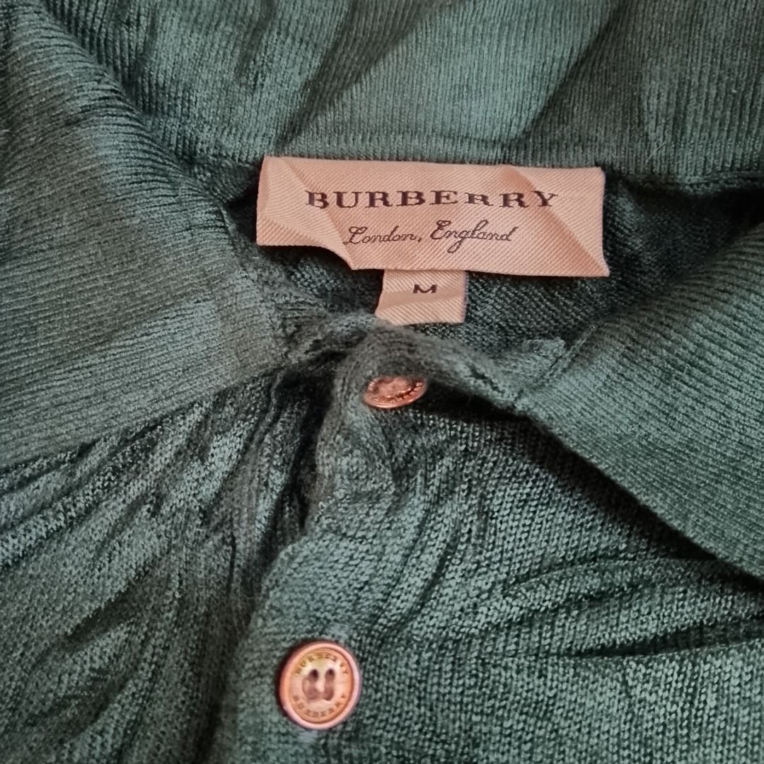 Burberry knitted polo (Category: Activewear) located in New Washington. Submitted by kodak_ice (Listing ID 1461379138, Image 2). Description: Dimes: 16x23 Excellent Condi No issue.