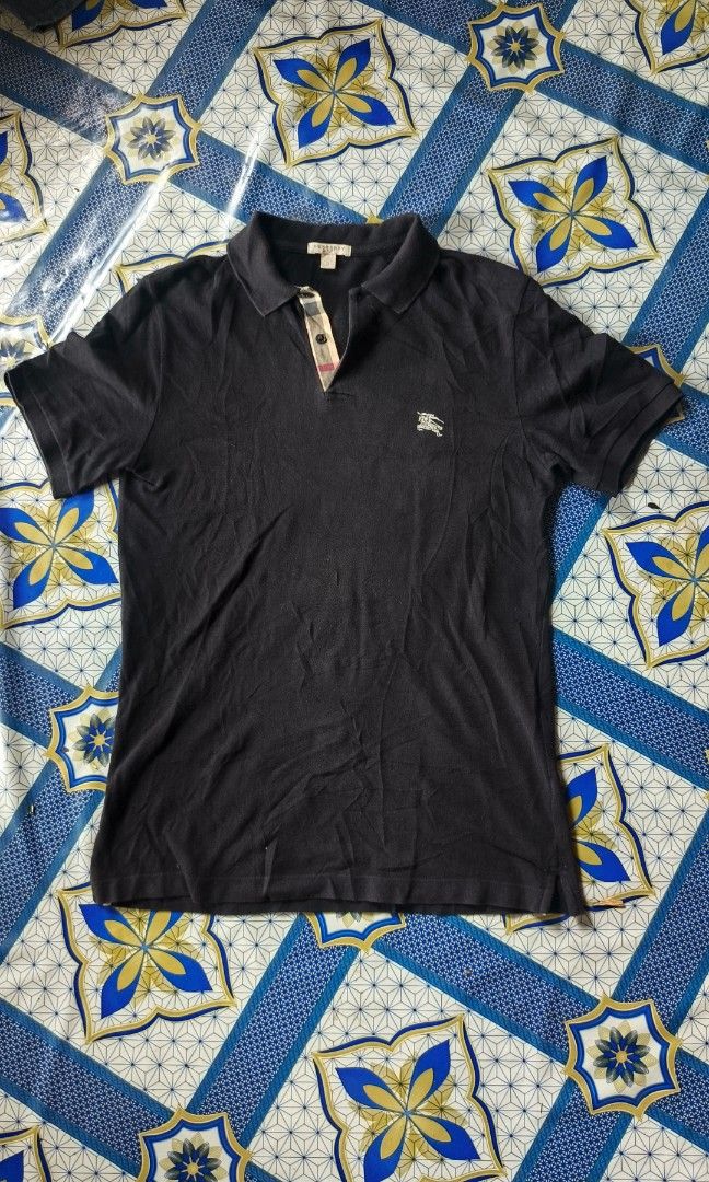 Burberry polo (Category: Tshirts & Polo Shirts ) located in Manila. Submitted by mackussil (Listing ID 1461487333, Image 1). Description: Burberry polo size. medium dimes. 19.5x29 complete tags no issue.