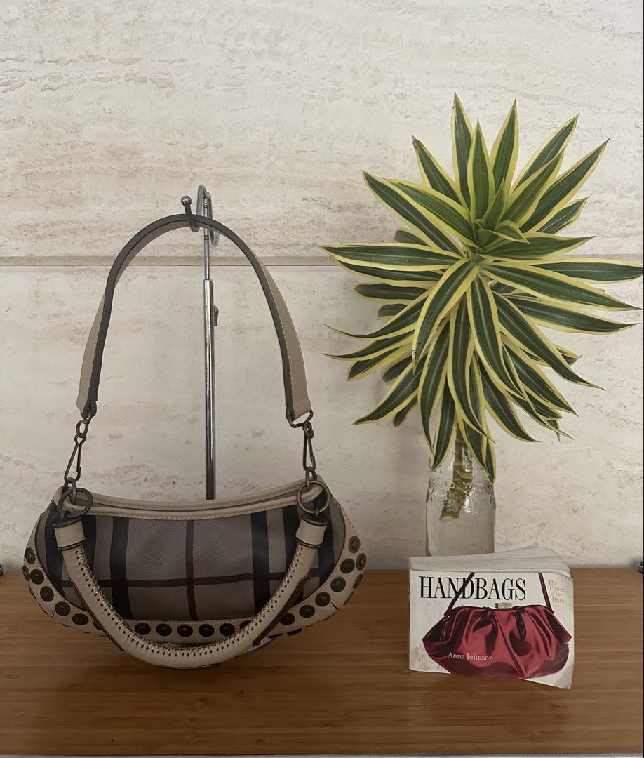 Burberry Prorsum Studded Check Shoulder Bag (Category: Luxury Bags & Wallets) located in Muntinlupa City. Submitted by belica (Listing ID 1461390436, Image 2). Description: - Authentic Burberry shoulder bag - Iconic check pattern in beige and dark brown - Studded detailing along edges and handles - Genuine leather trim and straps - Black fabric interior lining - Made in Italy - Stylish and perfect for everyday use.