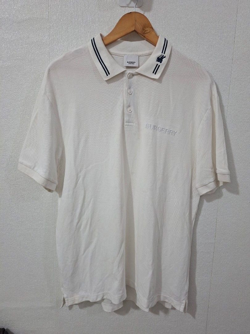 Burberry script logo embroidered (Category: Tshirts & Polo Shirts ) located in Cavite. Submitted by labbudds20 (Listing ID 1461489110, Image 3). Description: Burberry embroidered script logo polo shirts size xl armpit to armpit 22 inches length 30 inches excellent condition see pictures for details.
