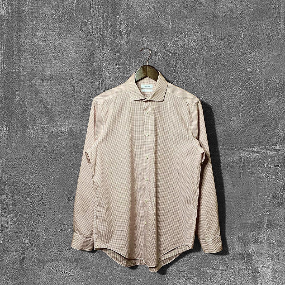 Calvin Klein Button down (Category: Formal Shirts) located in Quezon City. Submitted by donklasiko (Listing ID 1461554240, Image 1). Description: Condition: 9.5+/10 Pristine condition Issue: non Refer to the dimension 🤗 PM FOR MORE DETAILS NO RETURN, NO EXCHANGE & NO REFUND! ✅I ALSO ACCEPT TRADE/SWAP TO ANYTHING JUST DROP YOUR OFFER Please manage your expectations, this is a secondhand item. What you see is what you get 😊 💵MOP: GCASH, BDO or C