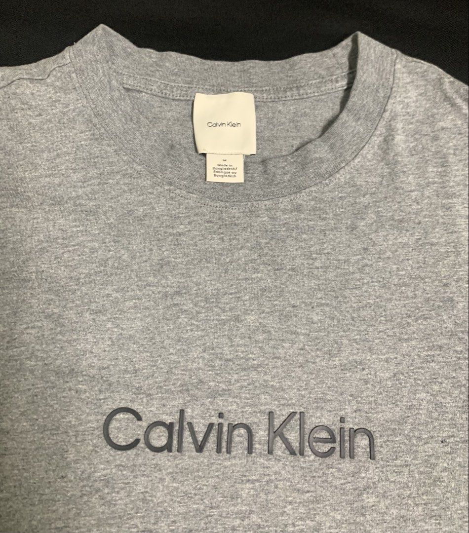 Calvin Klein Jungkook (Category: Tshirts & Polo Shirts ) located in Manila. Submitted by carbonstereoxide (Listing ID 1461486110, Image 2). Description: CK Jungkook Tshirt Sz: Medium. Dimension: w. 23 / l. 28.5 From CK store Central Square BGC. 1,3k only.
