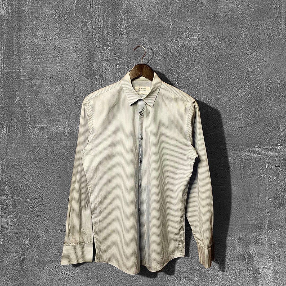 Calvin Klein Striped Button down (Category: Formal Shirts) located in Quezon City. Submitted by donklasiko (Listing ID 1461555021, Image 1). Description: Condition: 9.5+/10 Pristine condition Issue: non Refer to the dimension 🤗 PM FOR MORE DETAILS NO RETURN, NO EXCHANGE & NO REFUND! ✅I ALSO ACCEPT TRADE/SWAP TO ANYTHING JUST DROP YOUR OFFER Please manage your expectations, this is a secondhand item. What you see is what you get 😊 💵MOP: GCASH, 