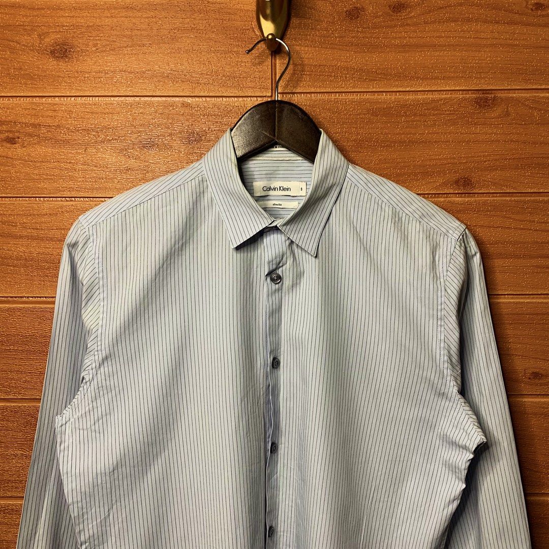 Calvin Klein Striped Button down (Category: Formal Shirts) located in Quezon City. Submitted by donklasiko (Listing ID 1461555021, Image 3). Description: Condition: 9.5+/10 Pristine condition Issue: non Refer to the dimension 🤗 PM FOR MORE DETAILS NO RETURN, NO EXCHANGE & NO REFUND! ✅I ALSO ACCEPT TRADE/SWAP TO ANYTHING JUST DROP YOUR OFFER Please manage your expectations, this is a secondhand item. What you see is what you get 😊 💵MOP: GCASH, 