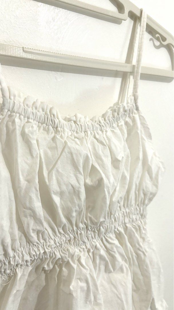 Cami Cinch-Waist Peplum Top (Category: Sleeveless) located in Caloocan City. Submitted by buymethisandthat (Listing ID 1461402965, Image 2). Description: ✨ Cami Cinch-Waist Peplum Top - ₱99 📌 CONDITION • Condition: 8.5/10 • Flaws: Minor storage creasing/wrinkling; 📏 SIZE • Tag Size: No size tag • Recommended: Fits Extra Small to Medium (Smocked Elastic Waist).
