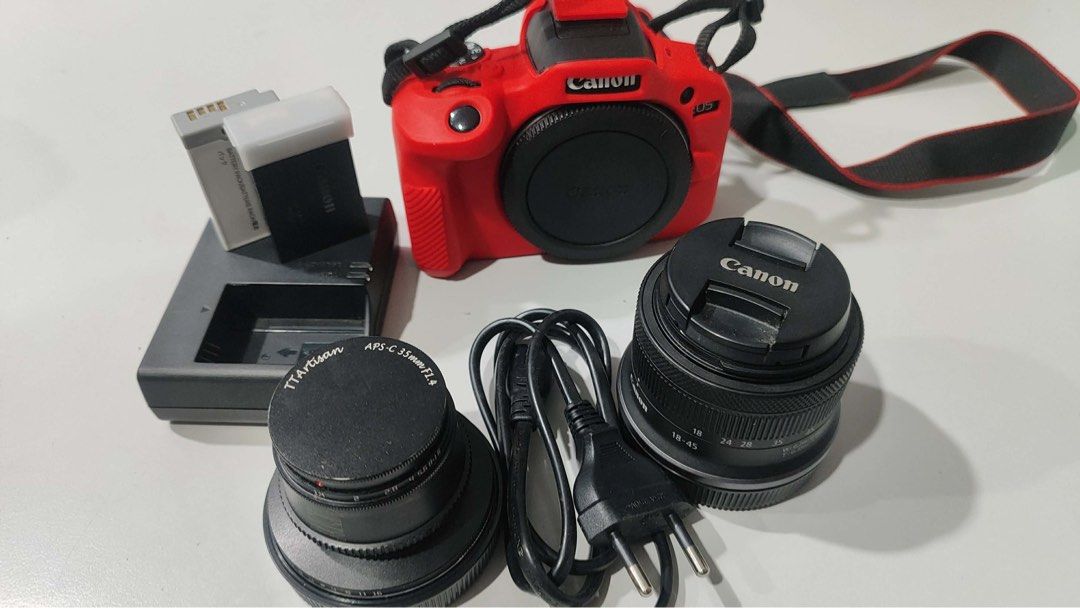 Canon EOS-R100 (APS-C) with accessories (Category: Cameras) located in Iloilo. Submitted by selectionsbykat (Listing ID 1461419866, Image 1). Description: Description: Brand: Canon Model: EOS-R100 (APS-C) Date of Purchase: Dec. 2024 Original Price: Php39,990.00 Other Remarks: -Used only during events (Christmas Party, Team Building, etc) Basic Inclusions: ✅Kit Lens (18-45mm) ✅Charger ✅Strap ✅Original Battery (Seldomly Used) ⚠️SD card not included