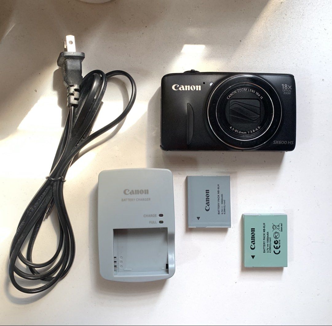 Canon SX600 HS (Irreparable) (Category: Cameras) located in Quezon City. Submitted by lijikore (Listing ID 1461334588, Image 1). Description: - Canon SX600 HS Camera - Tech said it's irreparable (rusted inside due to water damaged) - Includes Battery Charger (🍊 app-bought) - Includes Power Cord - Includes 2 Canon NB-6LH Batteries (one is bought from 🍊 app).