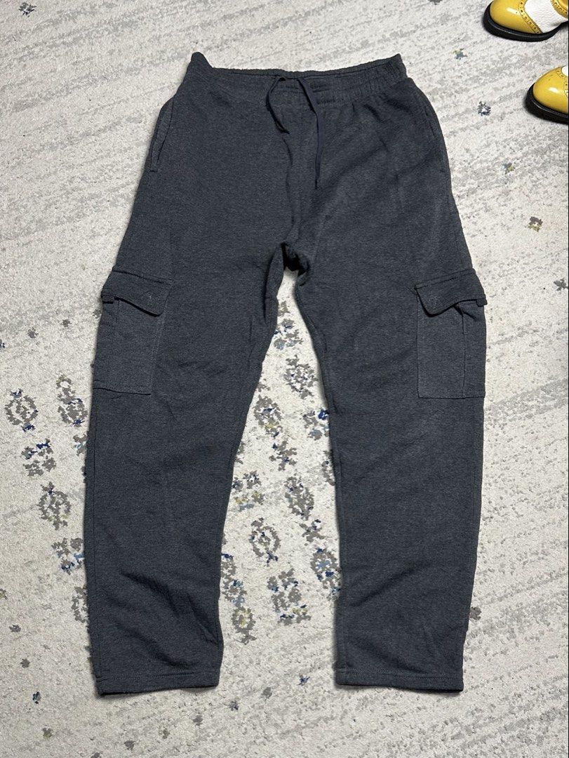 Cargo Sweatpants Waist 30-36 Length 41 (Category: Joggers) located in Daet. Submitted by thrifthings2018 (Listing ID 1461445549, Image 2). Description: - Dark grey cargo sweatpants - Fits waist sizes 30-36 inches - Length: 41 inches - Convenient side and back pockets - Adjustable drawstring waist for a custom fit - Made with comfortable material - Ideal for everyday casual wear.