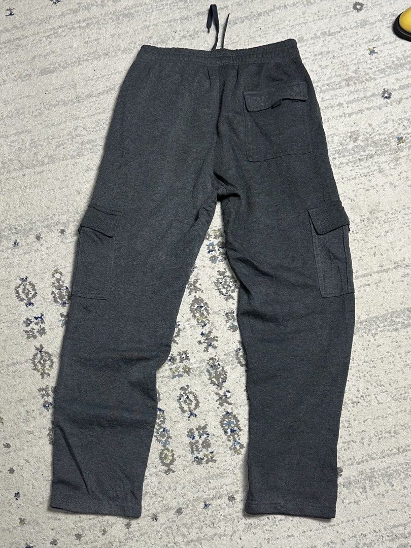 Cargo Sweatpants Waist 30-36 Length 41 (Category: Joggers) located in Daet. Submitted by thrifthings2018 (Listing ID 1461445549, Image 3). Description: - Dark grey cargo sweatpants - Fits waist sizes 30-36 inches - Length: 41 inches - Convenient side and back pockets - Adjustable drawstring waist for a custom fit - Made with comfortable material - Ideal for everyday casual wear.