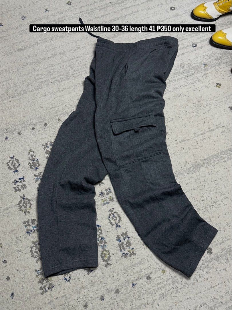 Cargo Sweatpants Waist 30-36 Length 41 (Category: Joggers) located in Daet. Submitted by thrifthings2018 (Listing ID 1461445549, Image 1). Description: - Dark grey cargo sweatpants - Fits waist sizes 30-36 inches - Length: 41 inches - Convenient side and back pockets - Adjustable drawstring waist for a custom fit - Made with comfortable material - Ideal for everyday casual wear.
