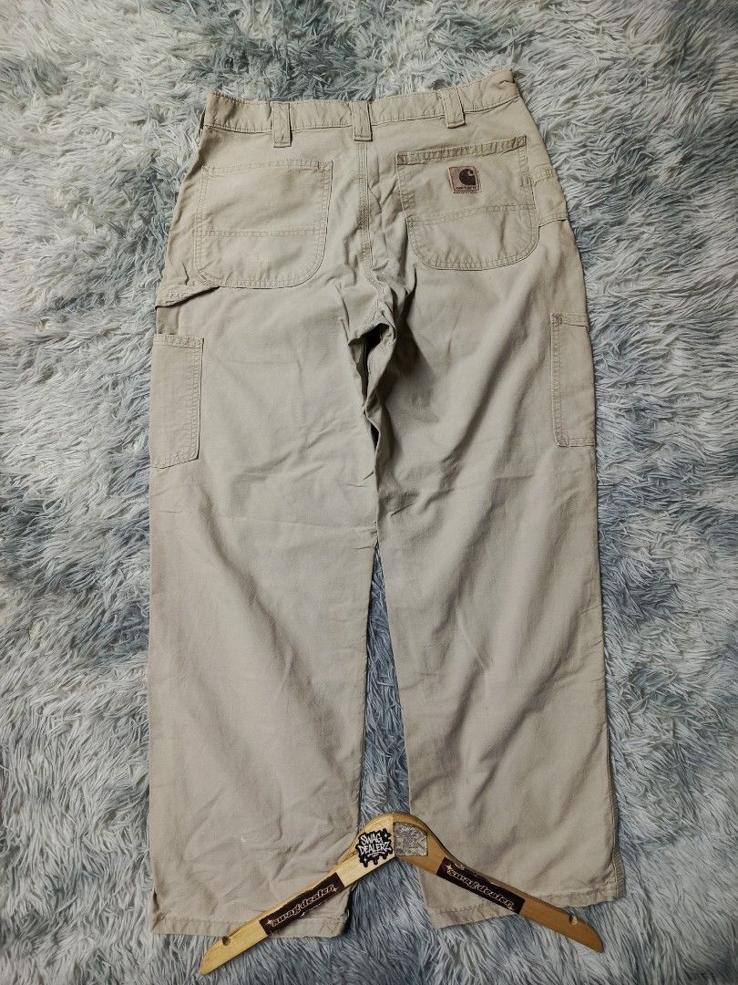 Carhartt Carpenter Pants (Category: Trousers) located in Manila. Submitted by swag_dealer (Listing ID 1461343619, Image 1). Description: Carhartt Carpenter Pants Length: 40 Waist: 30-32 Issue: fade leather patch and scratch left pocket Authentic💯 1500+sf.