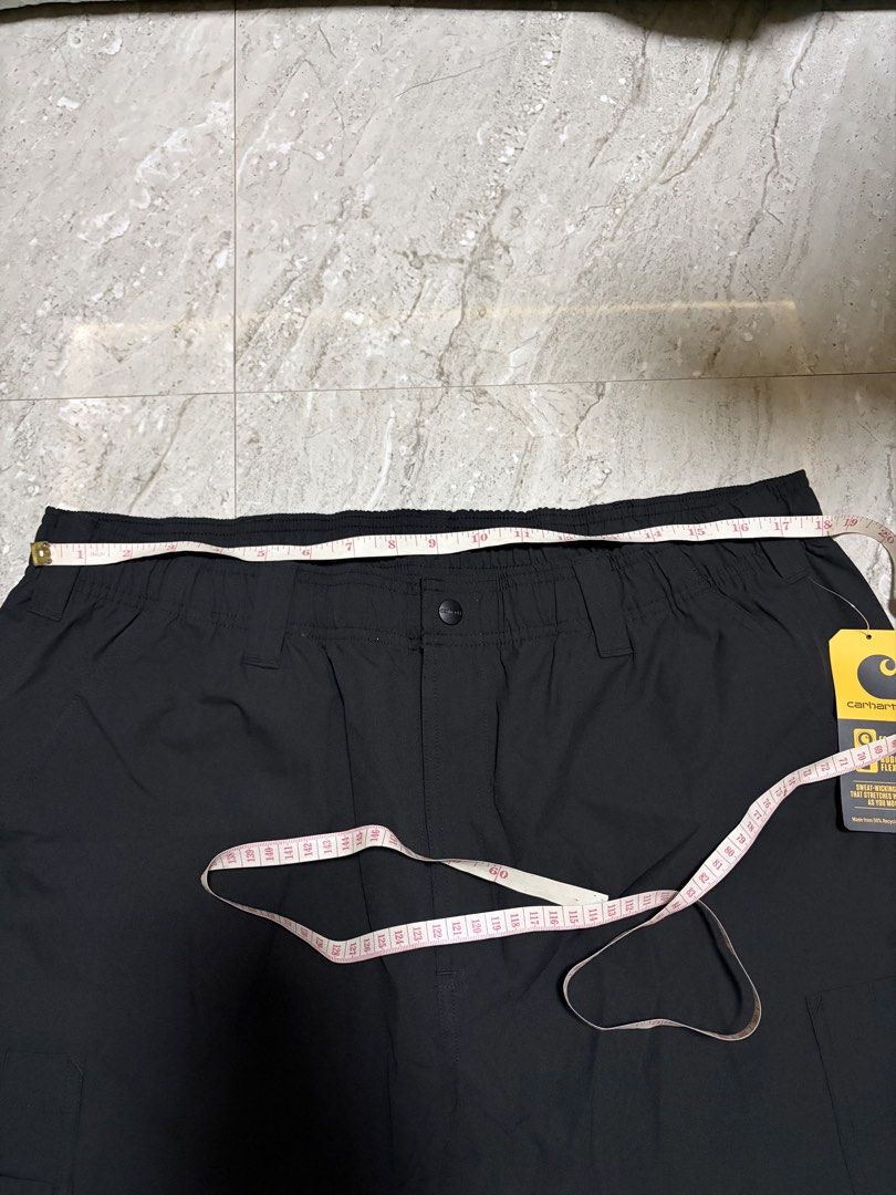Carhartt Force WIP Cargo Pants Black Regular XL (Category: Jeans) located in Guihulngan. Submitted by fbthriftgoodsniace (Listing ID 1461348722, Image 3). Description: - Brand: Carhartt WIP - 3 pcs. Available - Color: Black - Size: Regular XL - Material: 50% Recycled Polyester, 50% Polyester - Features: Elastic waistband with button closure, multiple cargo pockets - Condition: Brand new with tags attached - Style: Ideal for workwear or casual out