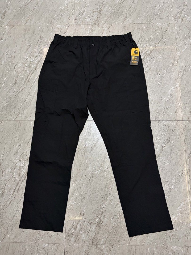 Carhartt Force WIP Cargo Pants Black Regular XL (Category: Jeans) located in Guihulngan. Submitted by fbthriftgoodsniace (Listing ID 1461348722, Image 2). Description: - Brand: Carhartt WIP - 3 pcs. Available - Color: Black - Size: Regular XL - Material: 50% Recycled Polyester, 50% Polyester - Features: Elastic waistband with button closure, multiple cargo pockets - Condition: Brand new with tags attached - Style: Ideal for workwear or casual out