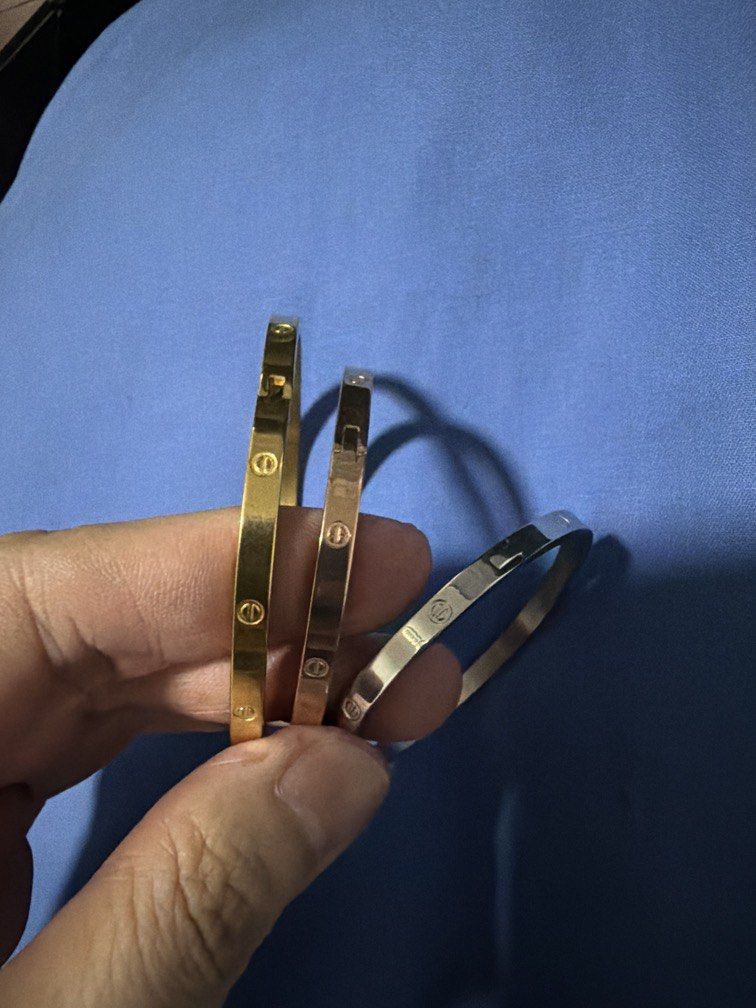 Cartier Bangle (Category: Announcements) located in Pasig City. Submitted by louise.339 (Listing ID 1461347698, Image 2). Description: Cartier Bangle Tri Color 3 pcs Stainless Almost new Size 15 .