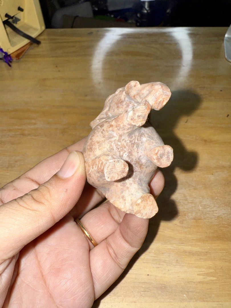 Carved Stone Elephant Figurine (Category: Other Home Decor) located in Pilar. Submitted by faveanyshop (Listing ID 1461354922, Image 3). Description: - Adorable stone elephant carving - Intricate details on trunk and ears - Small hollowed-out section on its back - Perfect for shelf or desk display - Adds charm to any space.