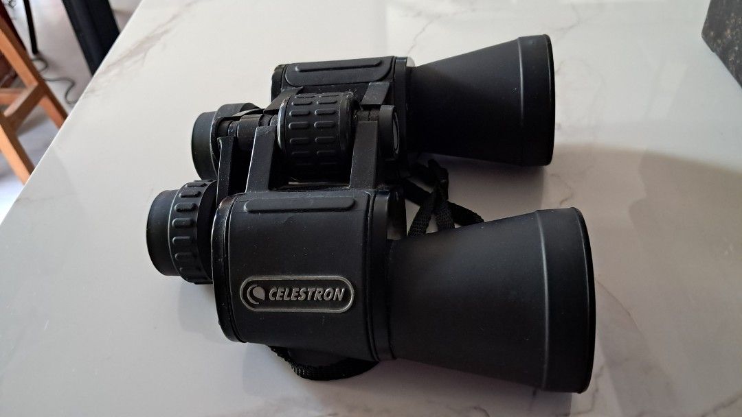Celestron Binoculars (Category: Travel Essentials & Accessories) located in Santa Rosa. Submitted by majanice (Listing ID 1461366658, Image 2). Description: - Black Celestron binoculars - Ideal for outdoor activities and bird watching - Focus wheel functions perfectly - Strap is included and attached - Ready for your next adventure.