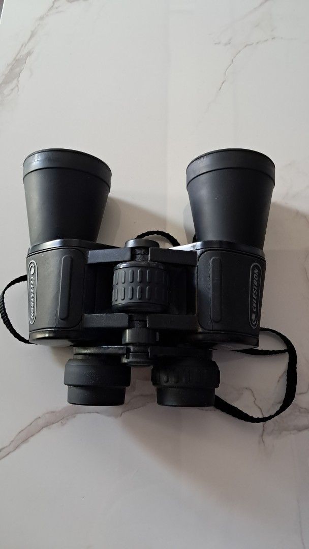 Celestron Binoculars (Category: Travel Essentials & Accessories) located in Santa Rosa. Submitted by majanice (Listing ID 1461366658, Image 1). Description: - Black Celestron binoculars - Ideal for outdoor activities and bird watching - Focus wheel functions perfectly - Strap is included and attached - Ready for your next adventure.
