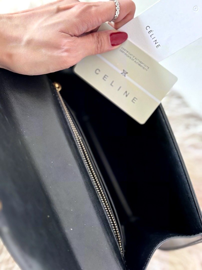 Celine Triomphe Bag Black Leather Gold Chain (Category: Shoulder Bags) located in Caloocan City. Submitted by mylove326 (Listing ID 1461438014, Image 2). Description: - Black Leather Celine Bag - Iconic Gold Triomphe Clasp - Elegant Gold Chain Strap - Structured, Timeless Shape - Versatile: Dress Up or Down - Fits Your Daily Essentials.