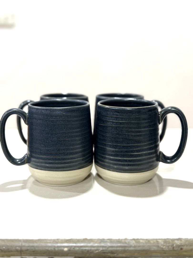 Ceramic Mugs (Navy) 4 Pieces (Category: Coffee & Tea Tableware) located in Mandaluyong City. Submitted by ardzensthrift (Listing ID 1461455896, Image 1). Description: Navy large ceramic mugs that can hold up to 500ml. Good quality..