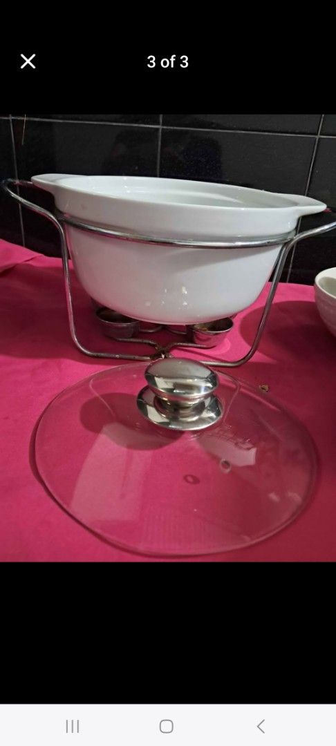 Ceramic White Dish Warmer (Category: Other Kitchenware & Tableware) located in Cainta. Submitted by ceejay.lim (Listing ID 1461477361, Image 2). Description: - ceramic white dish warmer and glass lid - Sturdy metal stand with fuel burner - Keeps food warm for parties and gatherings - Easy to use and clean .