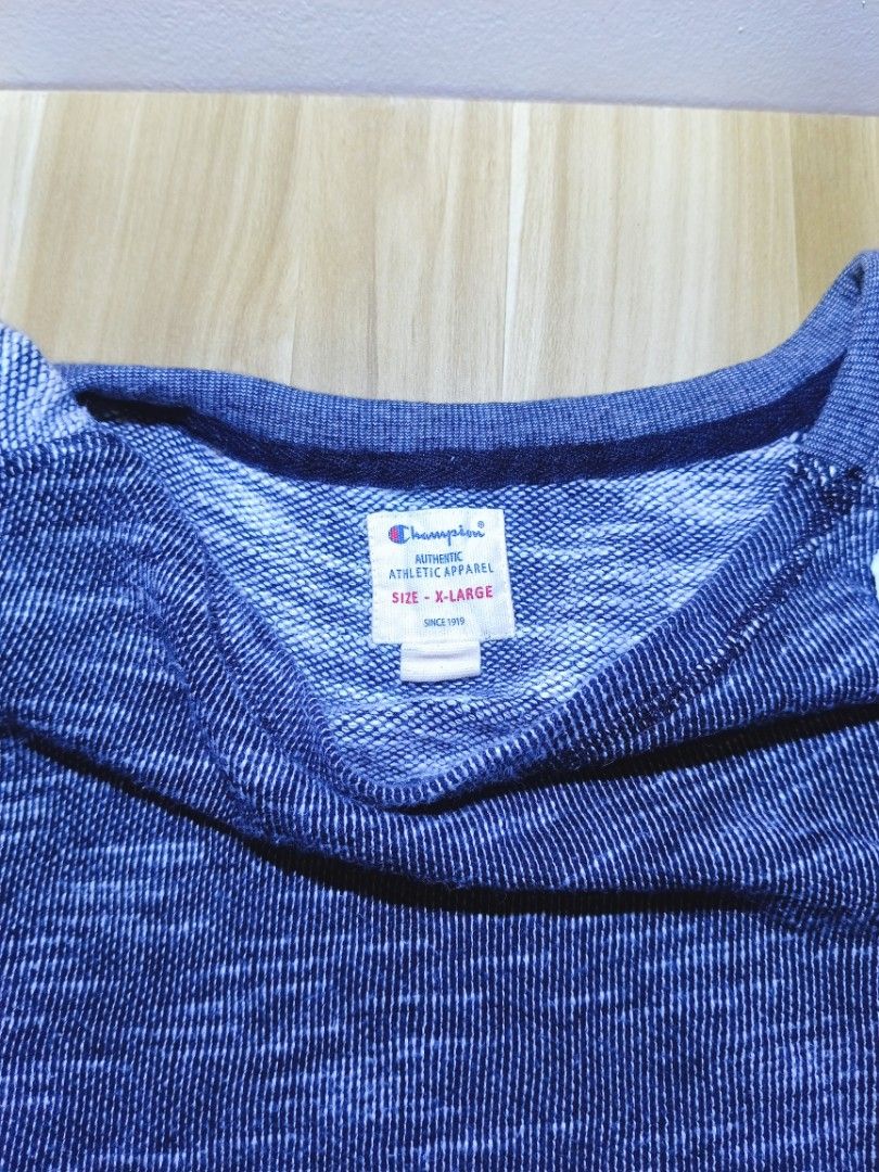 Champion Authentic Athletic Apparel Sweatshirt X-Large (Category: Luxury Apparel) located in Bayambang. Submitted by meowww1819 (Listing ID 1461387292, Image 3). Description: - Champion sweatshirt - Size: X-Large - Features: Raglan sleeves, marled grey and dark grey textured body, comfortable crew neck - Style: Great for casual wear or layering - Condition: Good (check tag for details) 💌 DM me for more info.