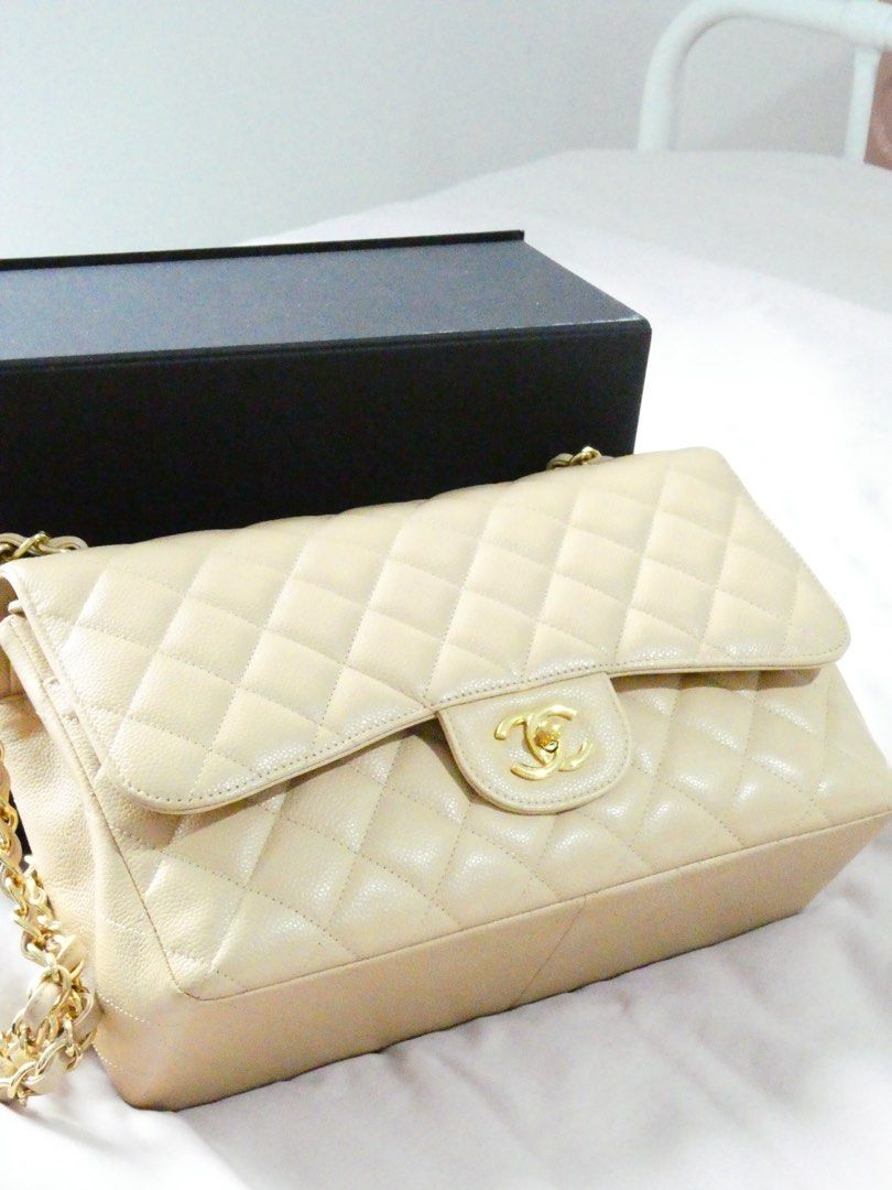 Chanel Classic Flap Bag Jumbo (Category: Luxury Bags & Wallets) located in Quezon City. Submitted by shopwithfrance (Listing ID 1461549821, Image 2). Description: - Classic Chanel flap bag - Beige lambskin leather Comes with box, dustbag, authenticity cards, paper bag - authentication.
