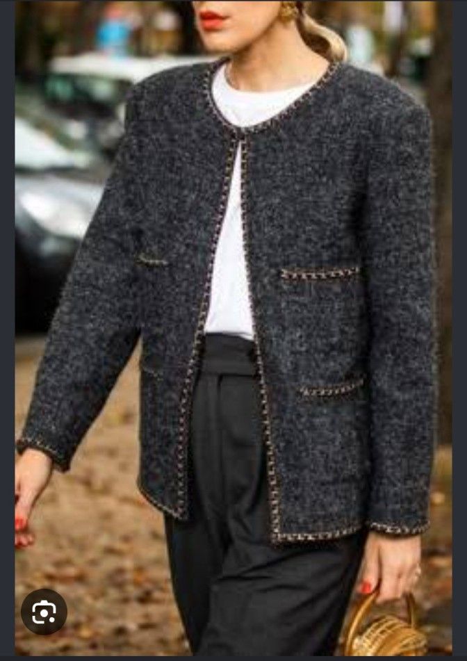Chanel Grey Tweed Jacket with Gold Trim (Category: Coats, Jackets and Outerwear) located in Manila. Submitted by faith_wm (Listing ID 1461484783, Image 2). Description: - Classic Chanel jacket - Grey tweed fabric - Gold chain trim on collar and pockets - Four front pockets with chain detail - Lined in luxurious pink silk - Timeless and versatile design - Perfect for dressing up or down.