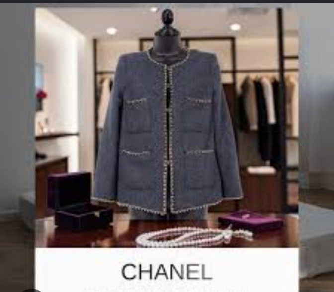Chanel Grey Tweed Jacket with Gold Trim (Category: Coats, Jackets and Outerwear) located in Manila. Submitted by faith_wm (Listing ID 1461484783, Image 1). Description: - Classic Chanel jacket - Grey tweed fabric - Gold chain trim on collar and pockets - Four front pockets with chain detail - Lined in luxurious pink silk - Timeless and versatile design - Perfect for dressing up or down.