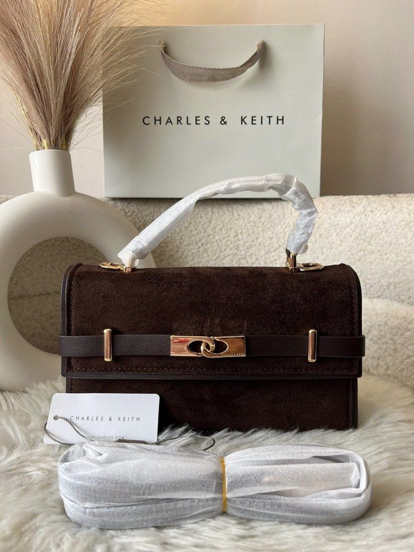 Charles & Keith Arlet Suede Bag - Espresso (Category: Shoulder Bags) located in Pasig City. Submitted by preloved.closet2 (Listing ID 1461558772, Image 1). Description: Size 9 inches With Sling add paperbag plus 80 .
