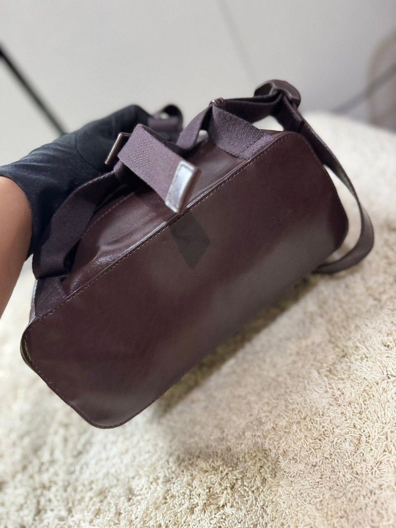 Charles & Keith Brown Leather Drawstring Backpack (Category: Backpacks) located in Manila. Submitted by shy177 (Listing ID 1461390438, Image 1). Description: - Brand: Charles & Keith - Material: Brown Leather - Closure: Drawstring with tassels - Straps: Adjustable for comfort - Style: Minimalist - Features: Spacious interior, ideal for everyday use.