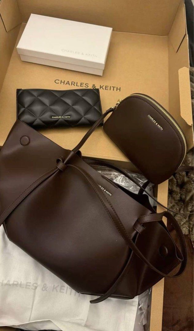 Charles & Keith Calla Tote Bag with Pouch (Category: Tote Bags) located in Manila. Submitted by sanghaya.mnl (Listing ID 1461557246, Image 3). Description: -Mpo -40x25x10 cm (large) -add fee for paperbag - 1300 for XL.