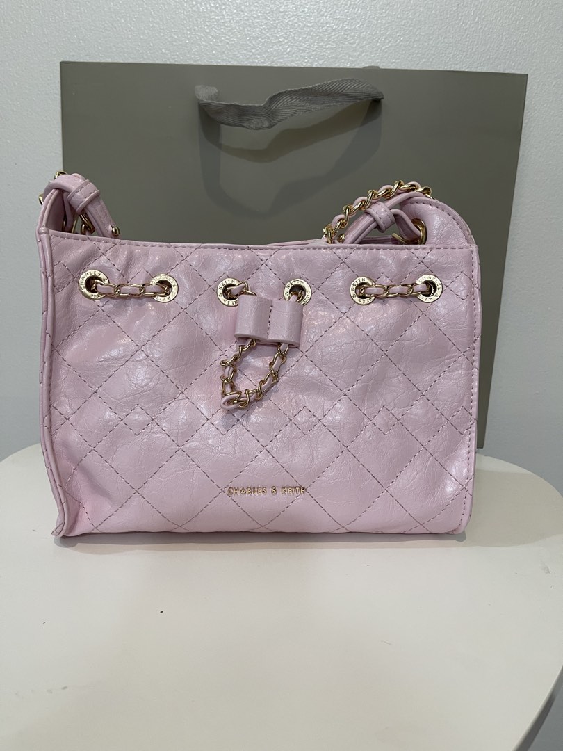 Charles & Keith Duo Shoulder Bag (Category: Shoulder Bags) located in Pasig City. Submitted by preloved.closet2 (Listing ID 1461533494, Image 2). Description: Available in 2 shades of pink Candy Pink - peach pink With Sling Add paperbag plus 80.