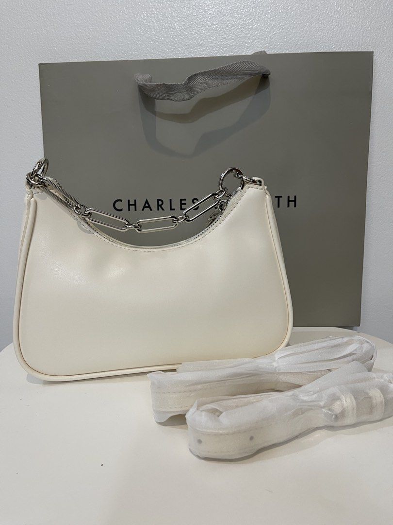 Charles & Keith Lane Chain Bag - White (Category: Shoulder Bags) located in Pasig City. Submitted by preloved.closet2 (Listing ID 1461534874, Image 2). Description: With Sling Color white .