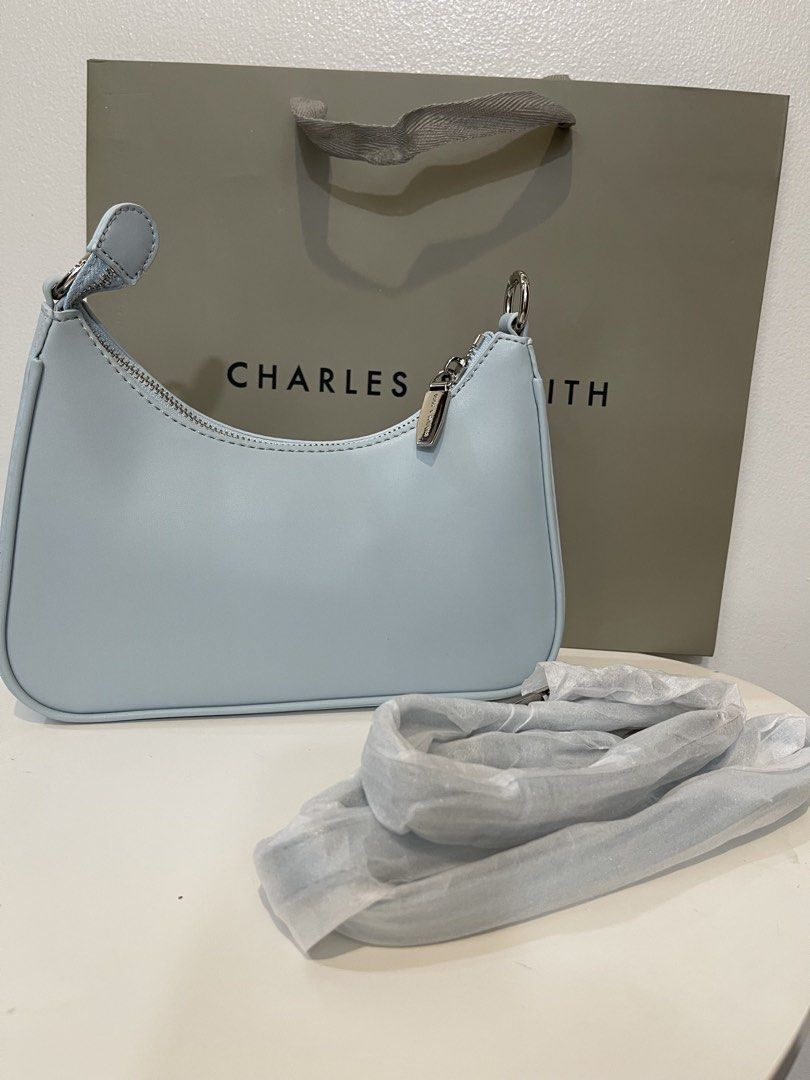 Charles & Keith Lane Chain Bag - Blue (Category: Shoulder Bags) located in Pasig City. Submitted by preloved.closet2 (Listing ID 1461558155, Image 2). Description: With Sling Add Paperbag plus 80.