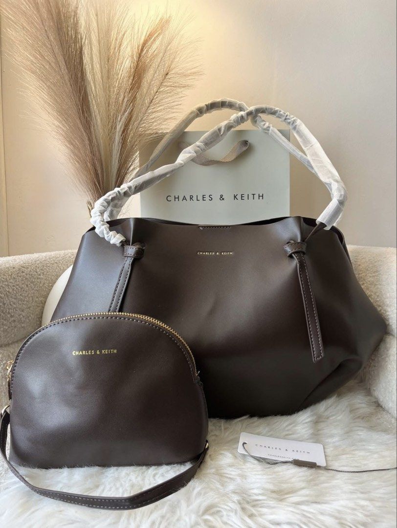 Charles & Keith Tote Bag with Pouch - Espresso(Large) (Category: Tote Bags) located in Pasig City. Submitted by preloved.closet2 (Listing ID 1461558583, Image 1). Description: Size Large MPO With Pouch Add paperbag plus 80 .