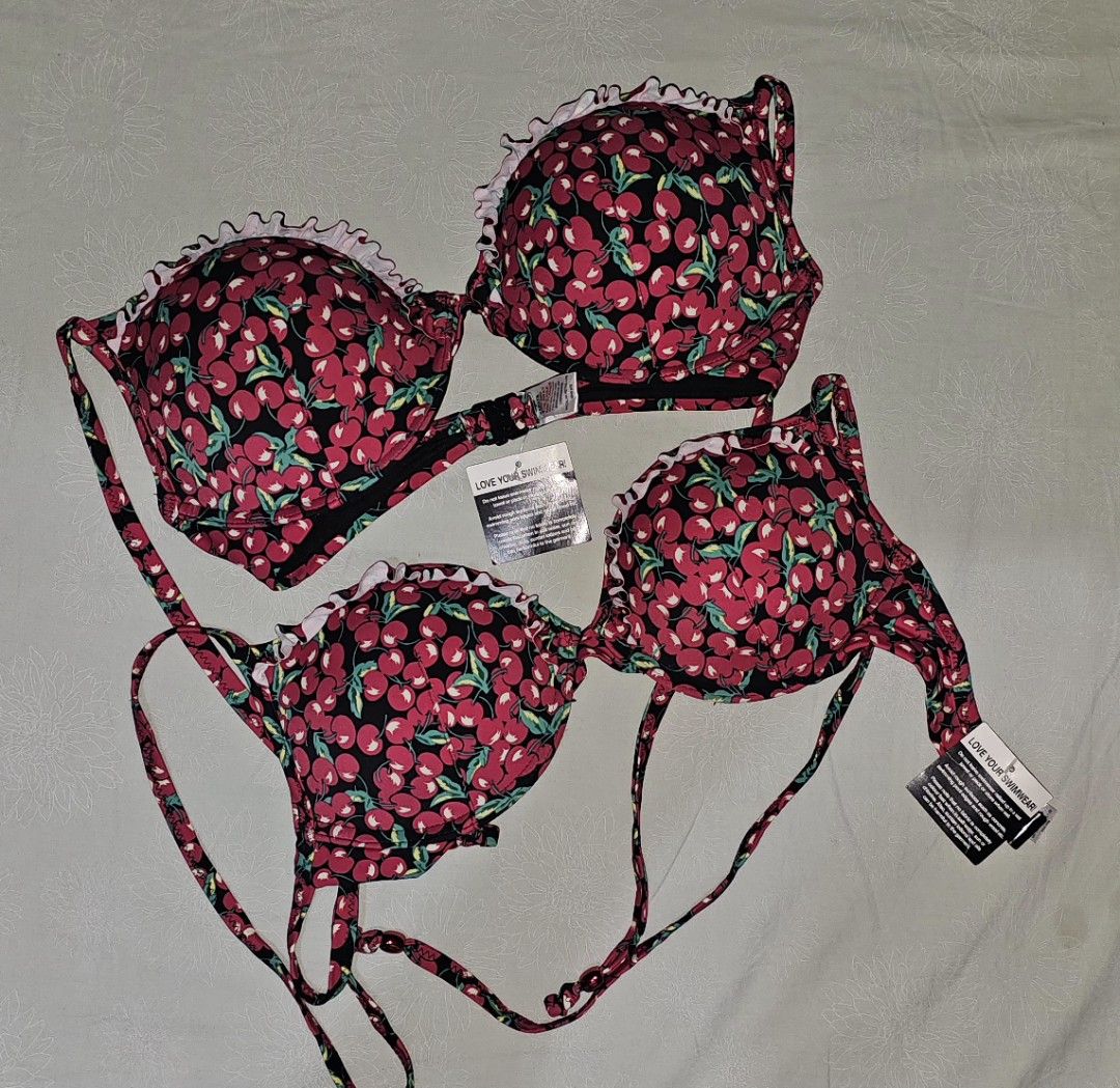 Cherry Print Bikini Top with Ruffles (Category: Bikinis & Swimsuits) located in San Jose del Monte. Submitted by stellarbeauty (Listing ID 1461459467, Image 1). Description: - Adorable cherry print bikini top - Features a cute ruffled trim along the top edge - Adjustable straps for a comfortable and customizable fit - Ideal for beach trips, pool days, and summer fun 1 pc - 32B 1pc - 34C.