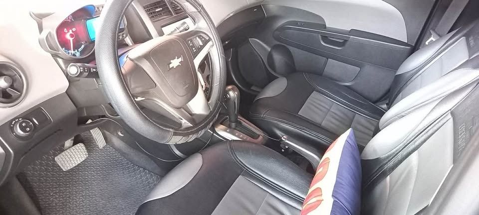Chevrolet Sonic 1.4 LTZ Hatchback (A) (Category: Used Cars) located in Caloocan City. Submitted by arki_lou.horse (Listing ID 1461415131, Image 3). Description: PTPA: For Sale Chevrolet Sonic LTZ FULL OPTION 2015 Model- HatchBack. Location: Lubao Pampanga ,Slightly Negotiable upon Viewing for Serious Buyers only. -1st Owner, Reason for Selling: Living in Abroad. -Low Mileage- 48,243 km. -1.4 liter Engine, Double overhead cam (DOHC), 16 valve. -6 